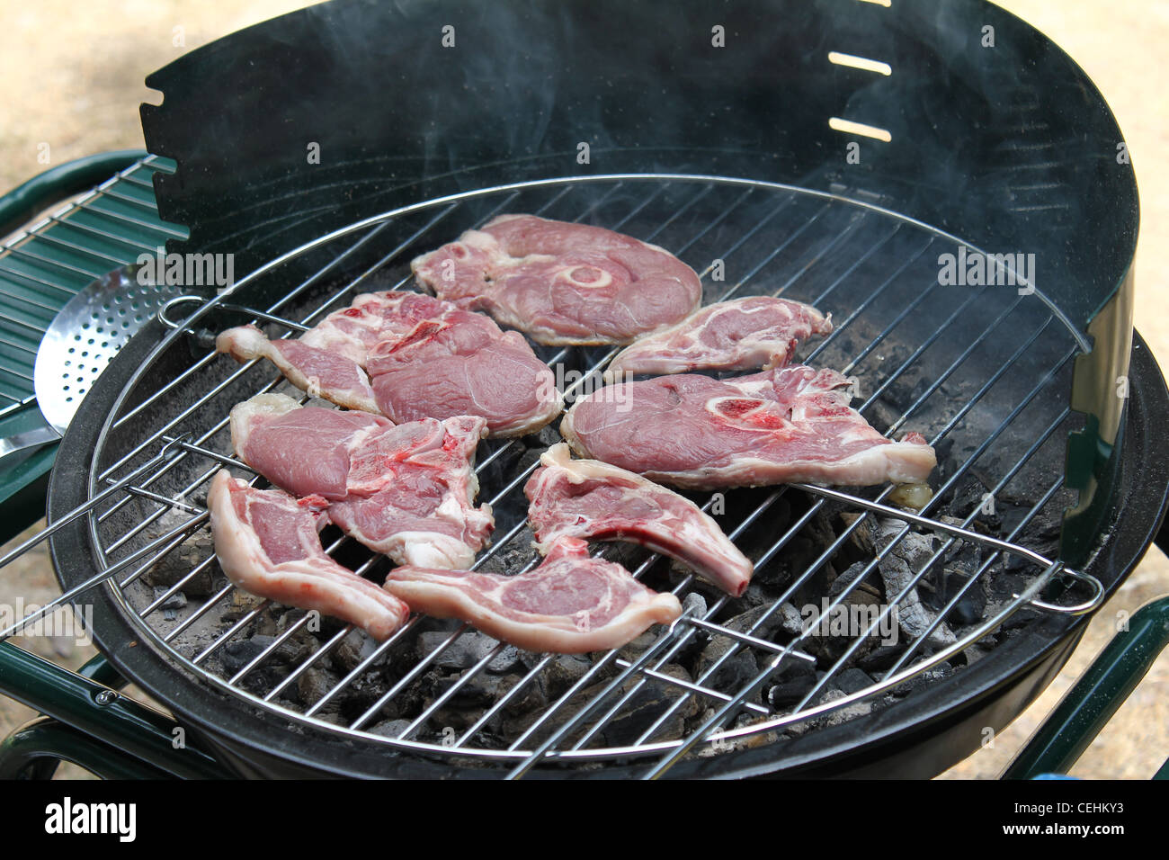 Barbecue meat outside Stock Photo - Alamy