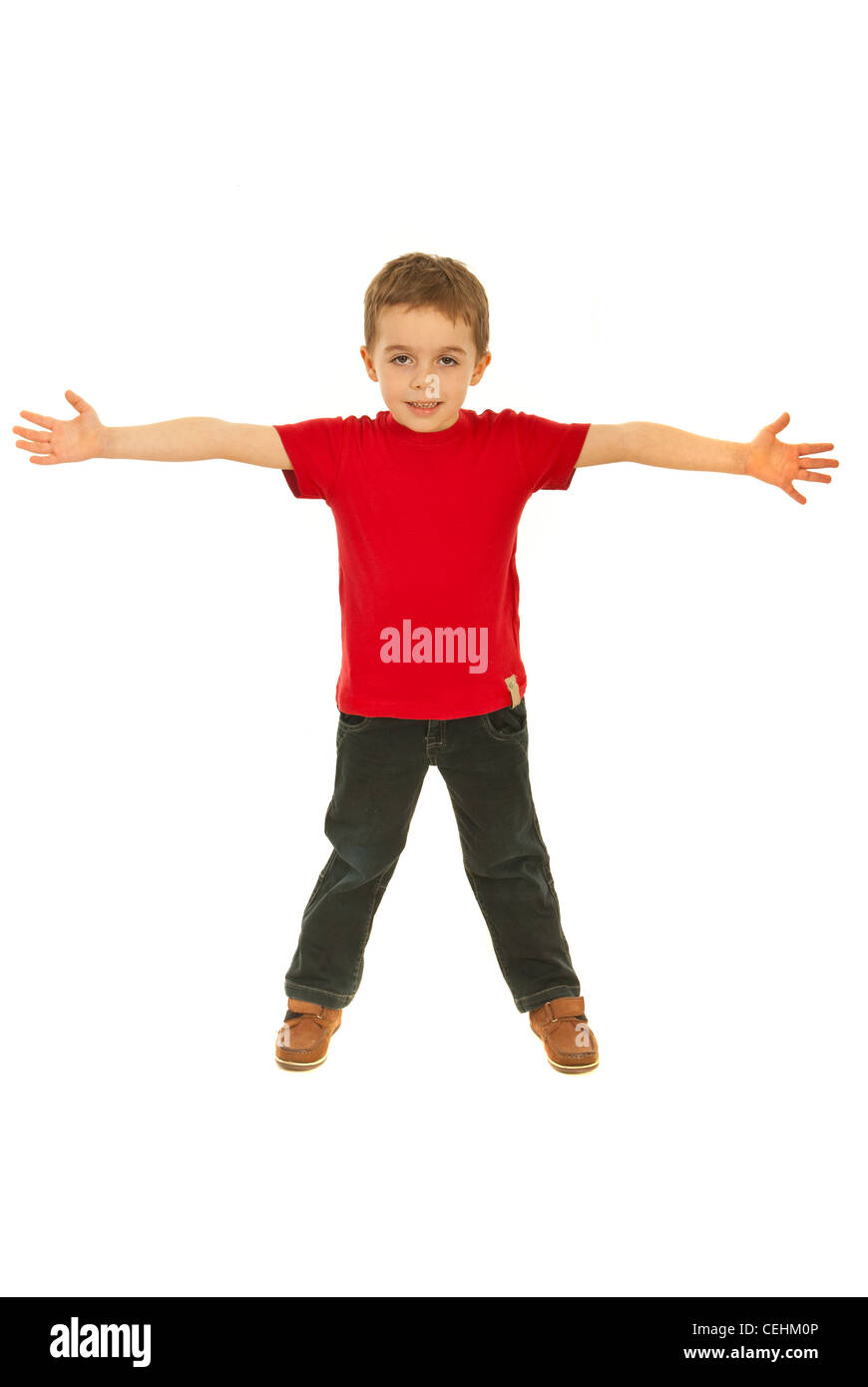 Happy boy wearing red blank tshirt and standing with arms open