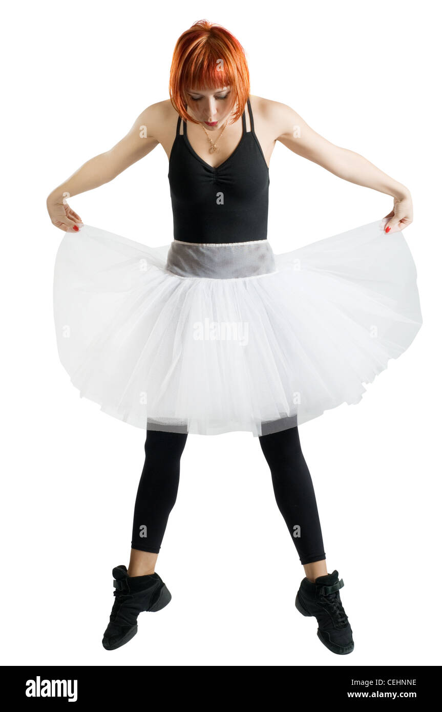 Red ballerina wearing black tutu posing on white background Stock Photo