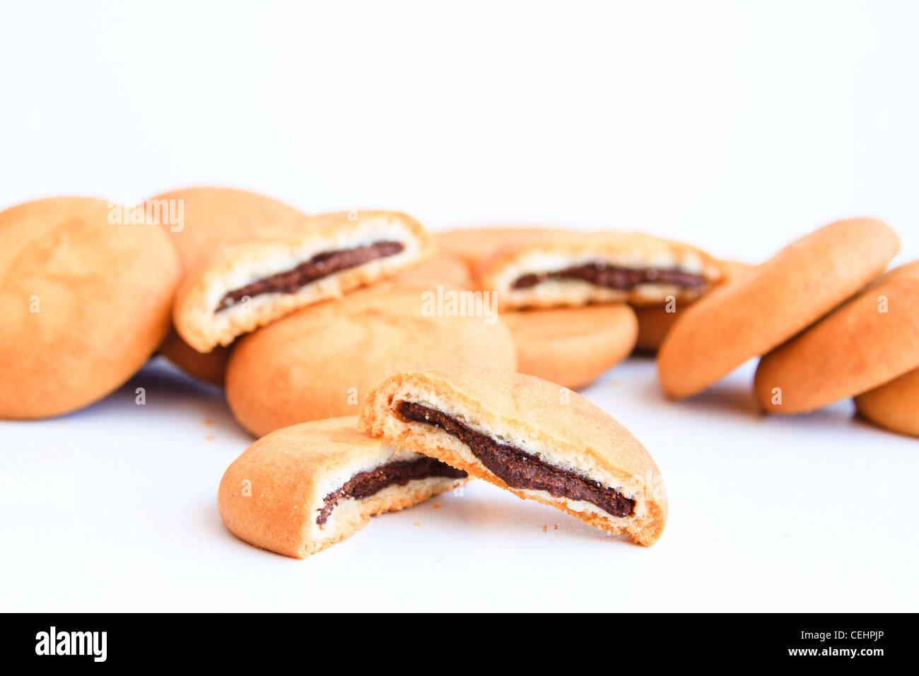 biscuits filled with chocolate isolated on white Stock Photo