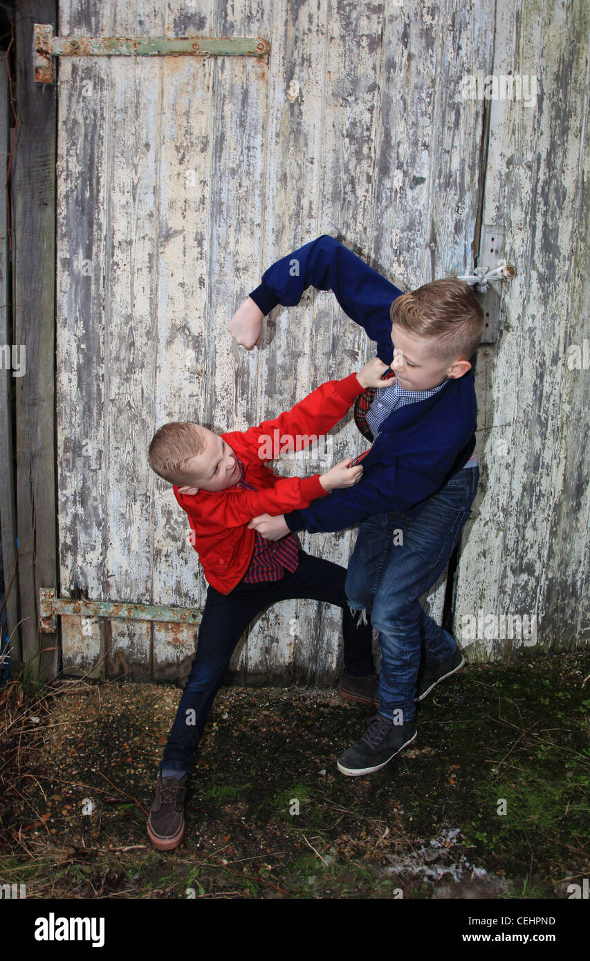 2 brothers posing outside Stock Photo