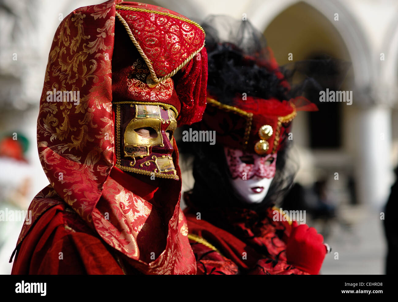 Traditional Venetian carnival costumes at the San Marco Square Stock Photo