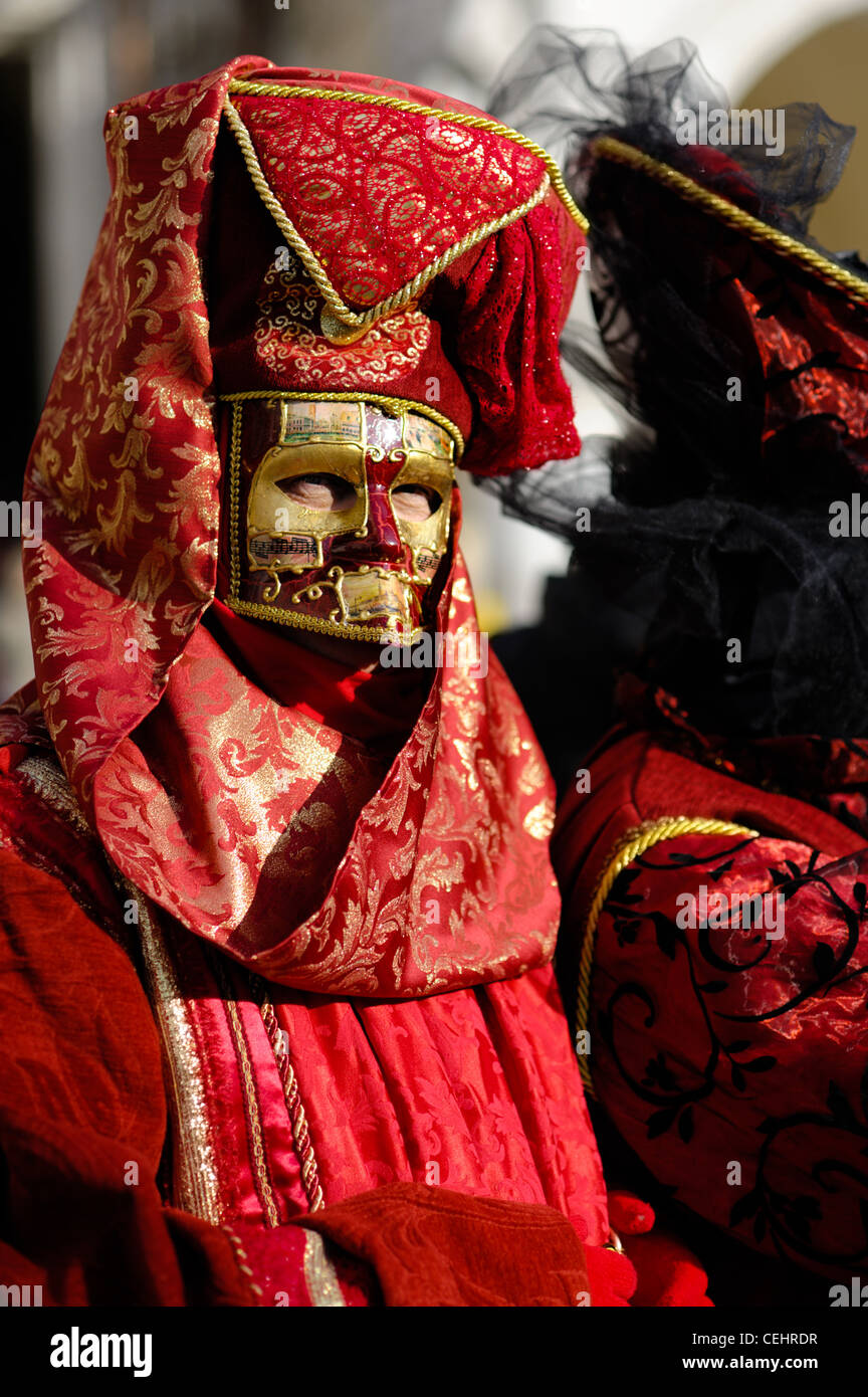 Traditional Venetian carnival costume at the San Marco Square Stock Photo