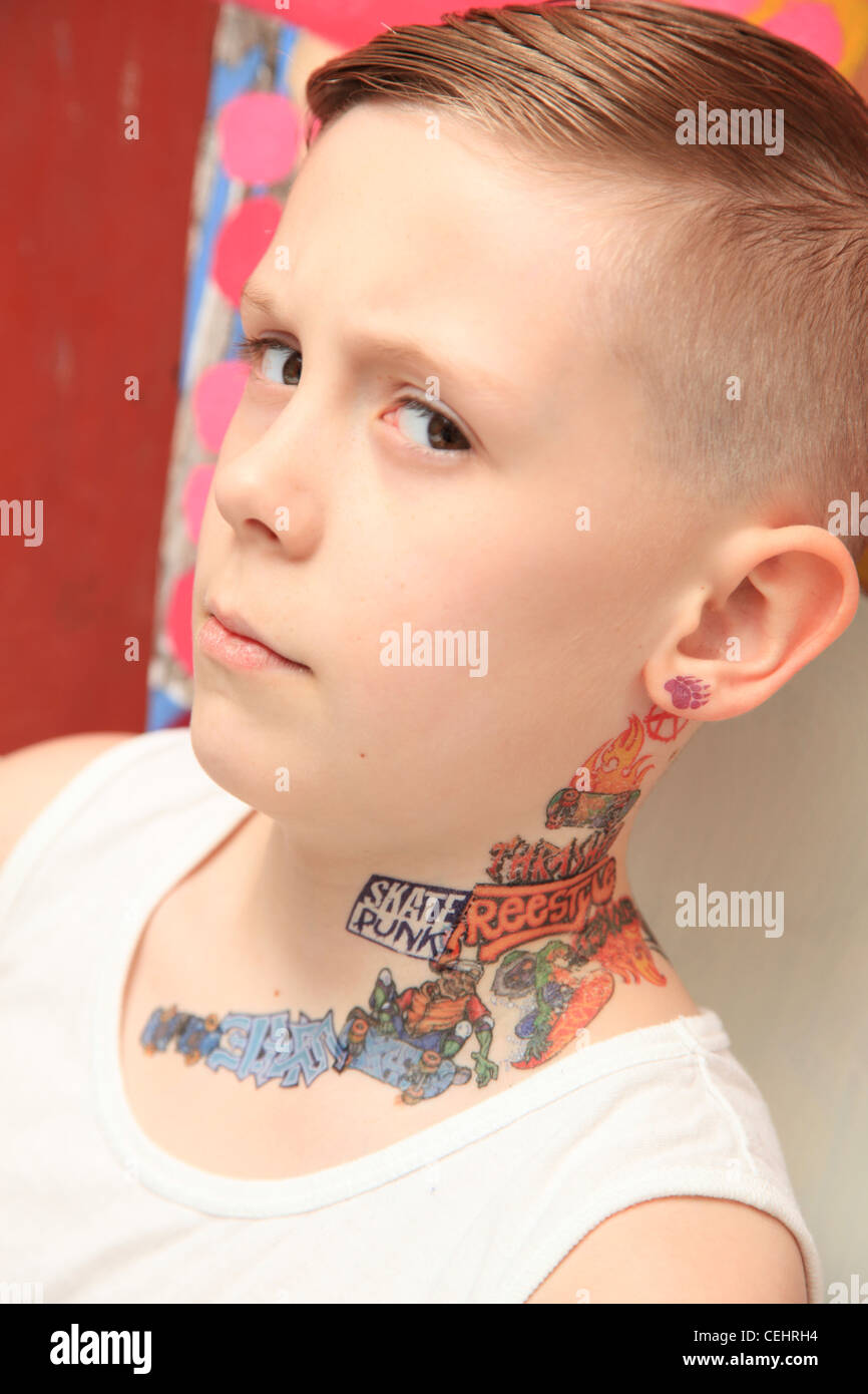Portrait of an 8 year old boy with a tattoo and attitude Stock Photo - Alamy Portrait of an 8 year old boy with a tattoo and attitude Stock Photo - Alamy