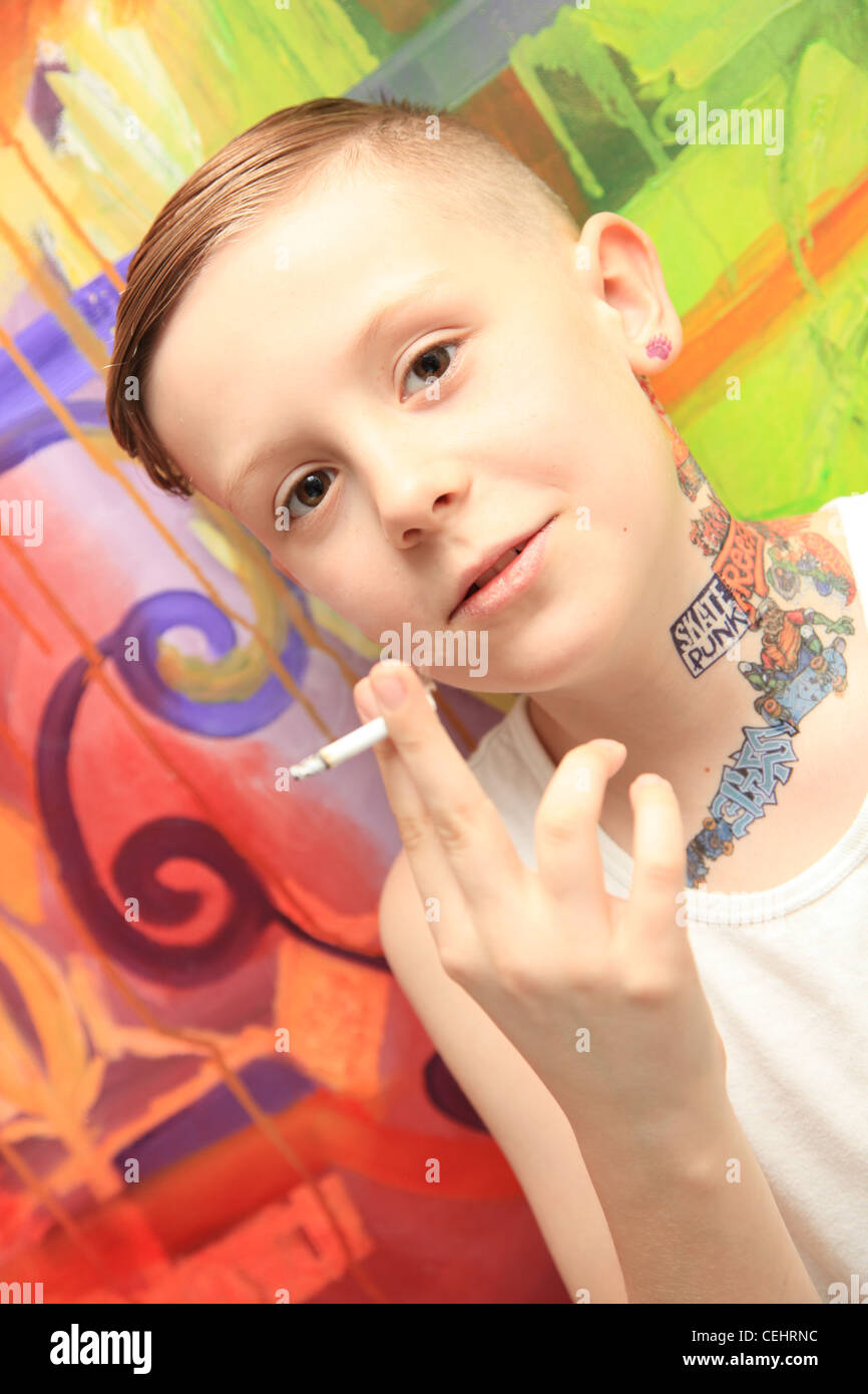 8 -9 yr old boy smoking Stock Photo