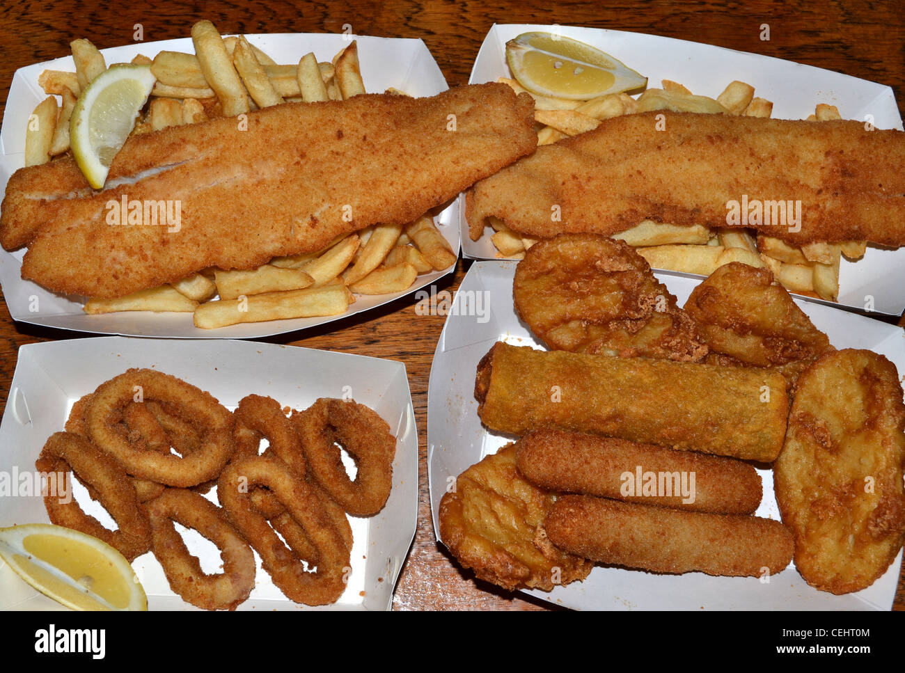 fish and chips, calamari, Chiko Roll, potato scallop, lemon fried seafood  Stock Photo - Alamy
