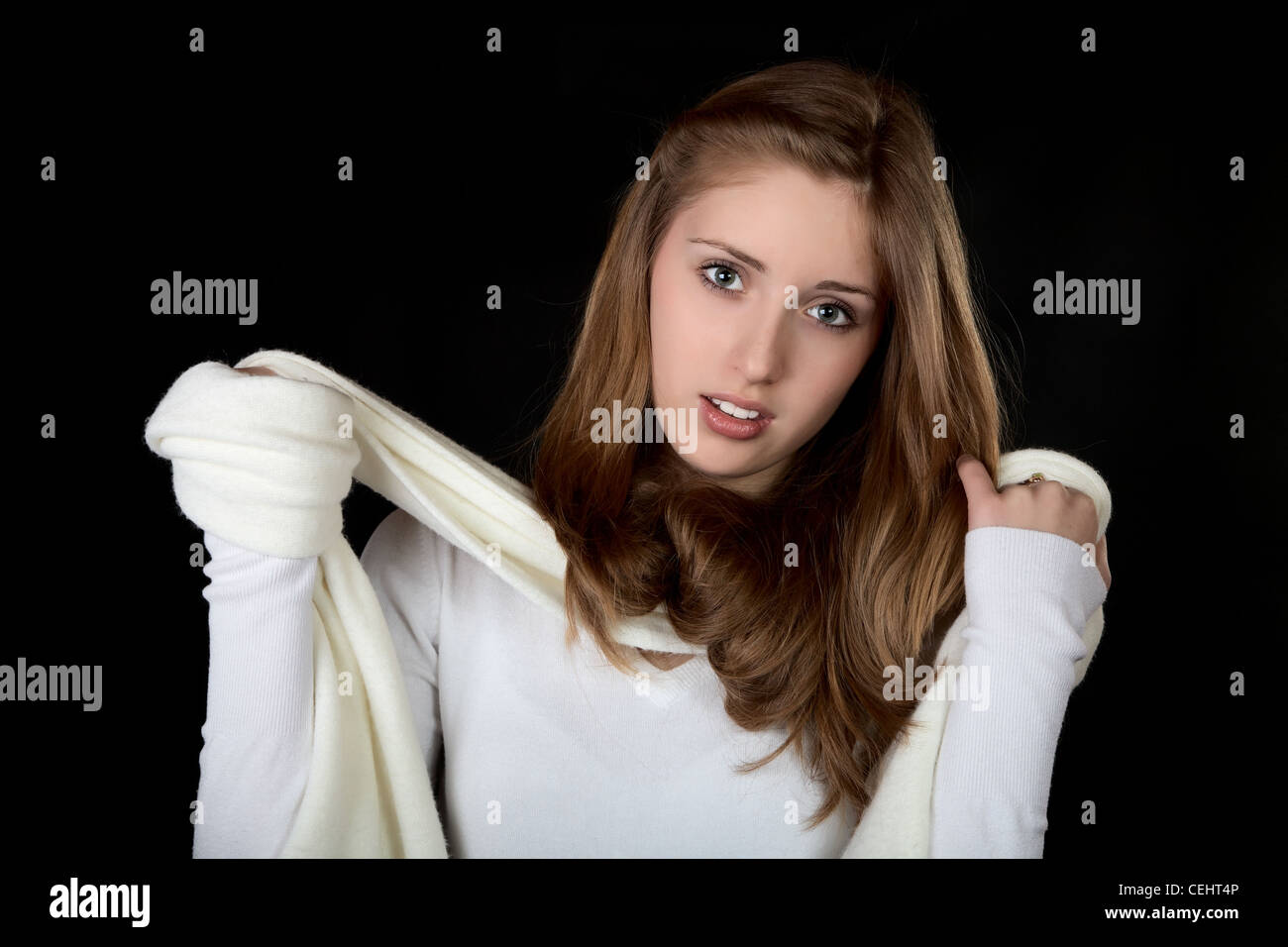 Portrait of the girl with a scarf on black background Stock Photo Alamy