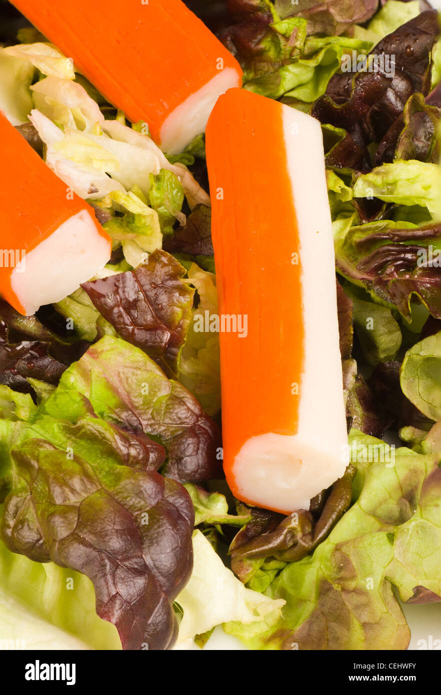 Surimi sticks and lollo rosso salad, a healthy starter Stock Photo Alamy