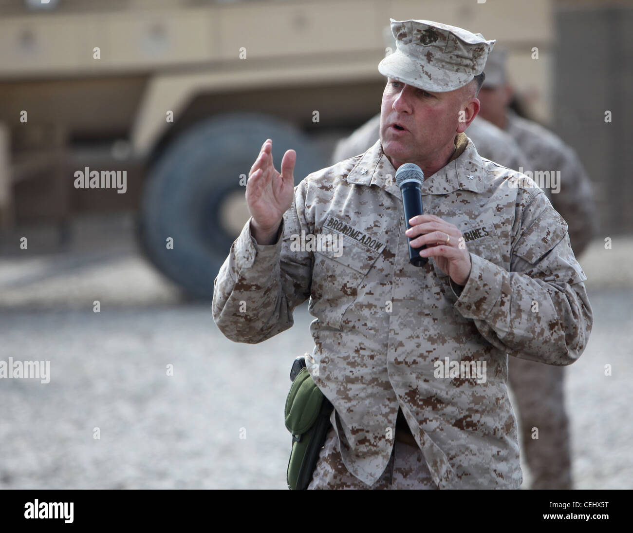Brig. Gen. John J. Broadmeadow, commanding general of 1st Marine Logistics Group (Forward), addresses guests during a transfer of authority ceremony aboard Camp Leatherneck, Afghanistan, Feb. 15. For the next year, 1st MLG (FWD) will assume all logistical support responsibilities in southern Afghanistan. Stock Photo