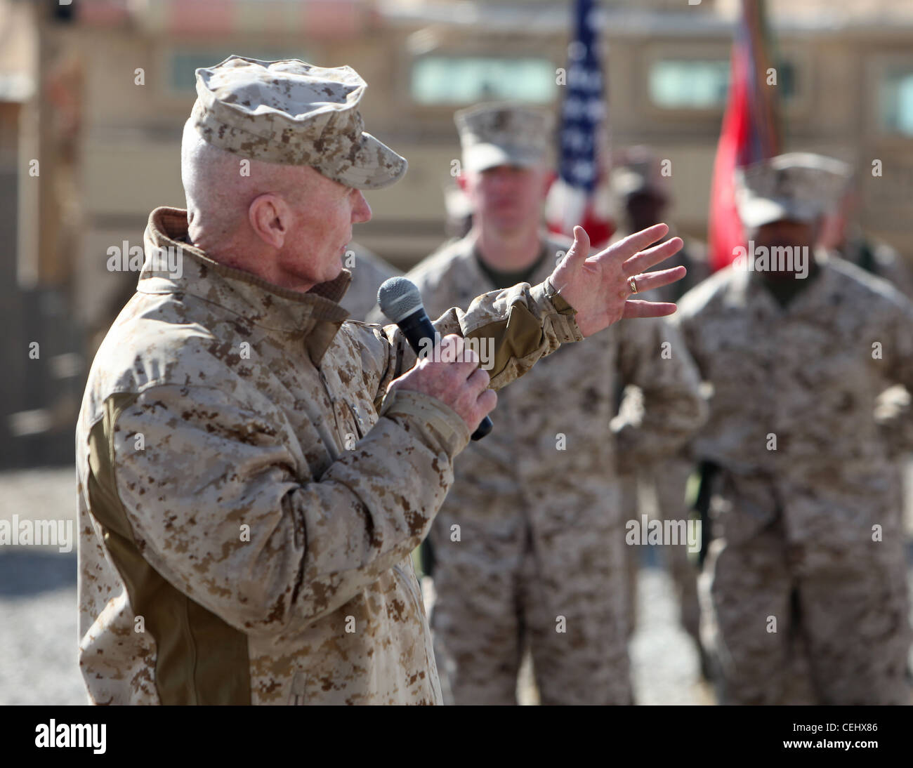 Maj. Gen. John A. Toolan, the commanding general of Regional Command Southwest, praises the Marines and Sailors of 2nd Marine Logistics Group (Forward) during a transfer of authority ceremony aboard Camp Leatherneck, Afghanistan, Feb. 15. For the next year, 1st MLG (FWD) will serve as the Logistics Combat Element in southern Afghanistan. Stock Photo