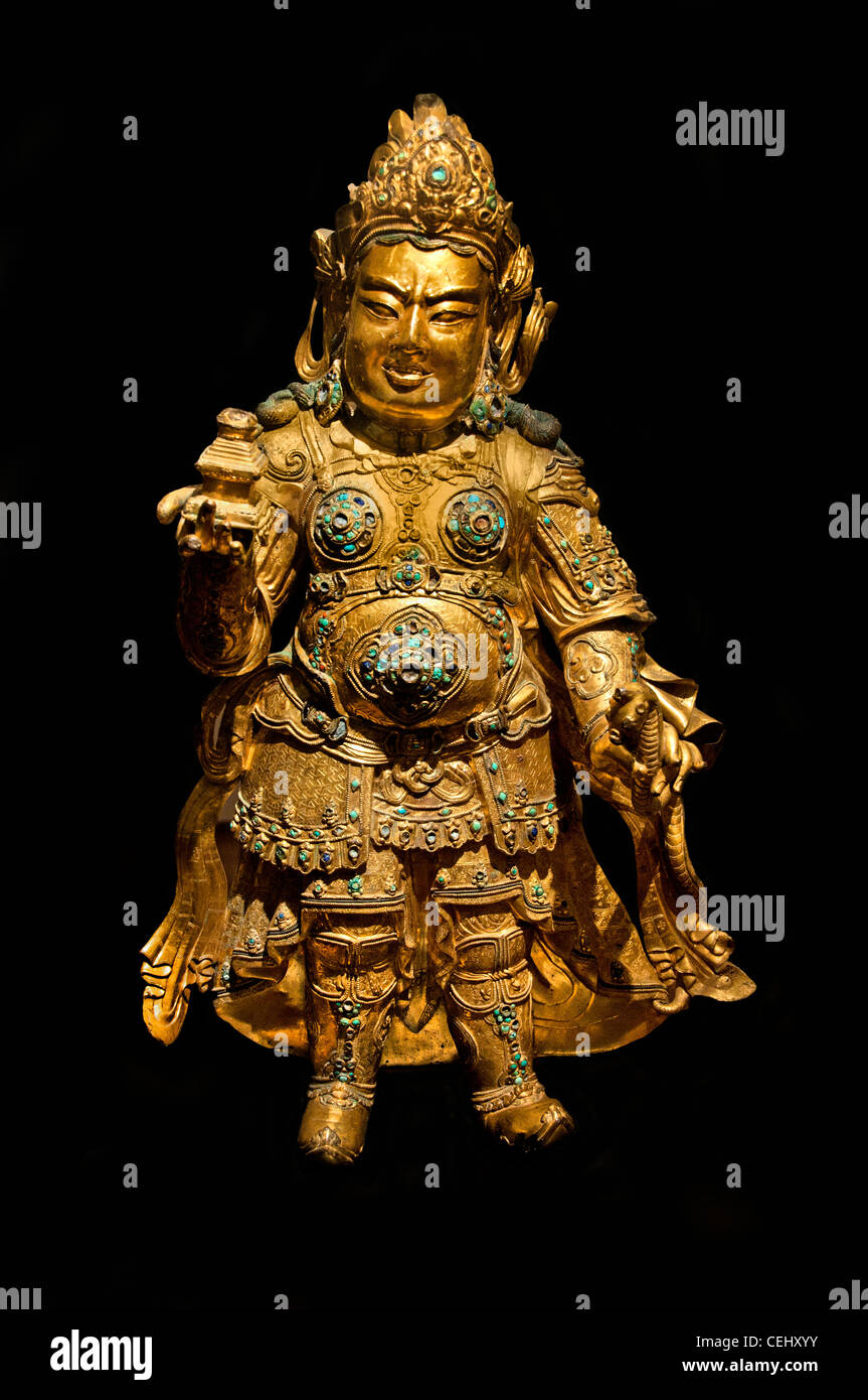 Virupaksha guardian king of the continent of Western Tibet The 15 Century Copper gilt and inlaid Stock Photo