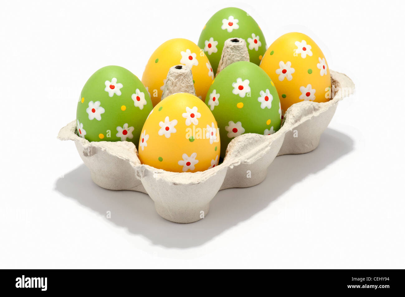 Decorated Easter eggs in an egg box Stock Photo