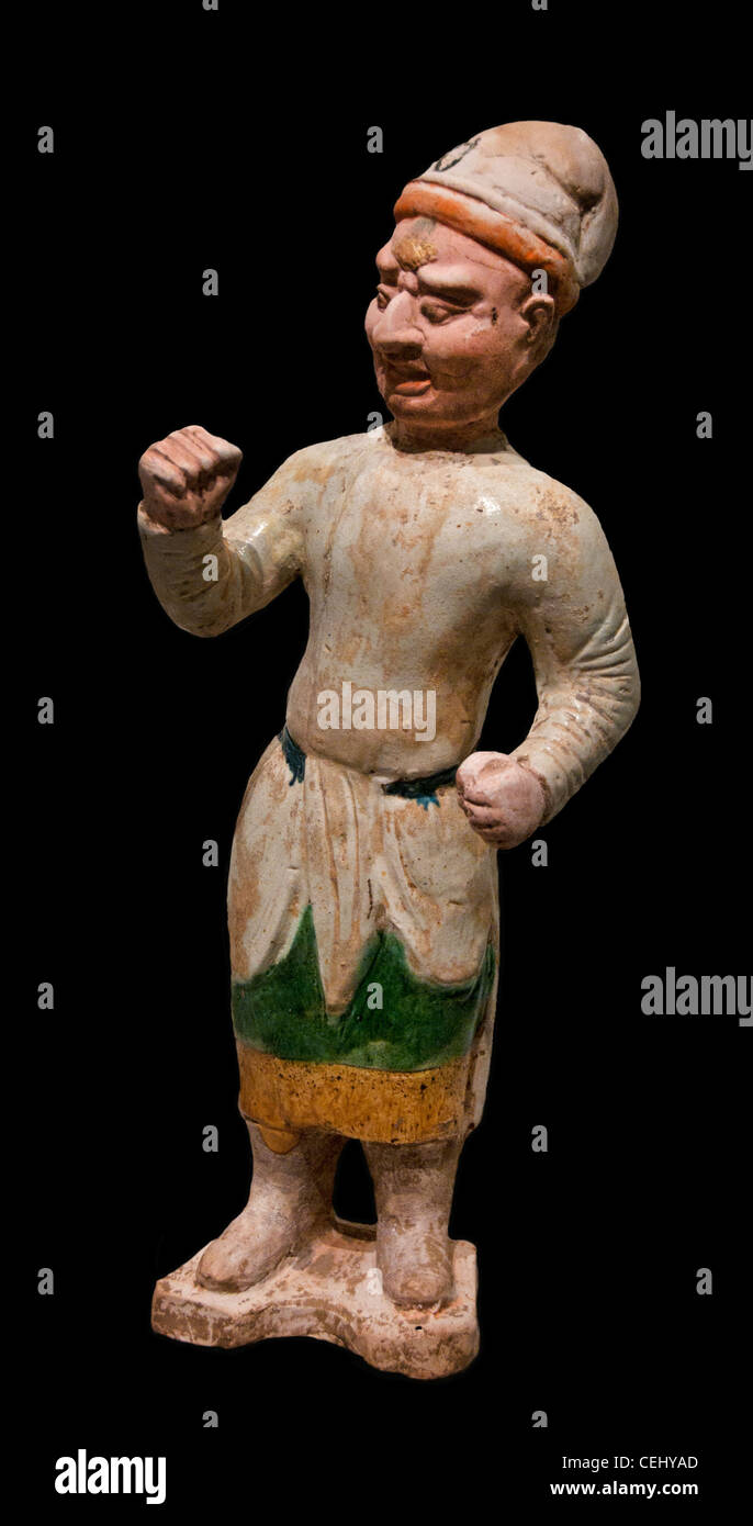 Groom 7 Century AD Tang Dynasty China Chinese terracotta glaze Stock Photo