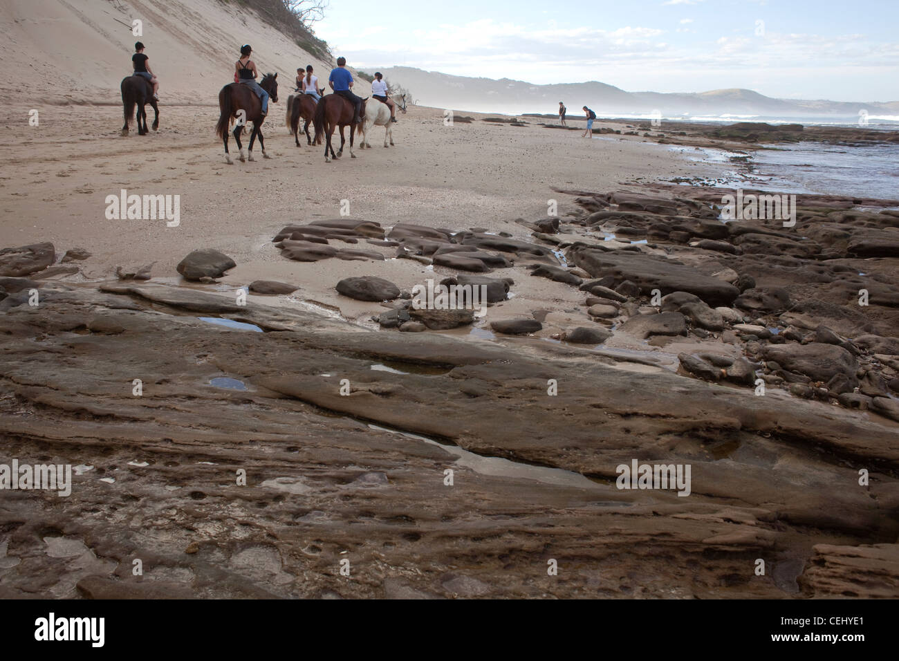 Horseriding on the beach,Cintsa,Eastern Cape Stock Photo
