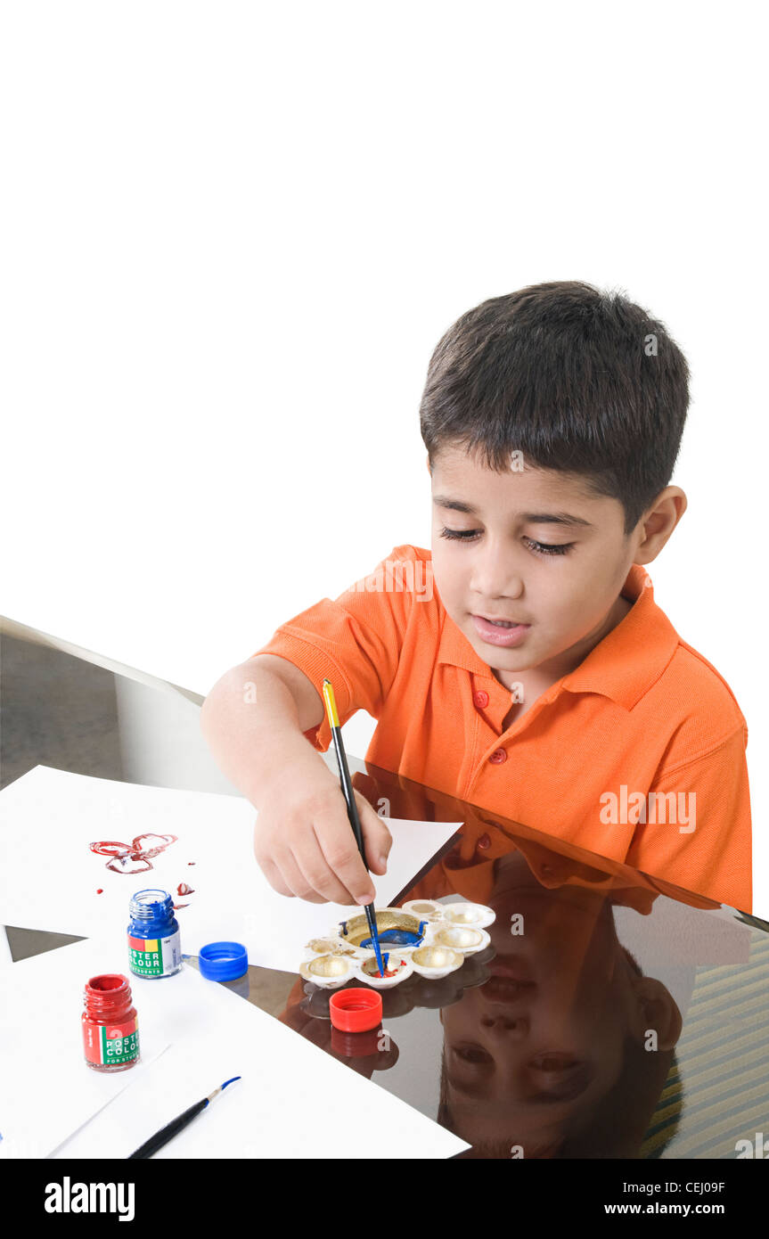 a small child painting Stock Photo Alamy