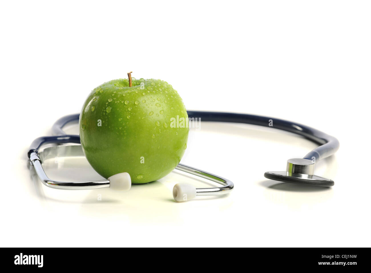 Stethoscope and Apple isolated on a white background Stock Photo Alamy