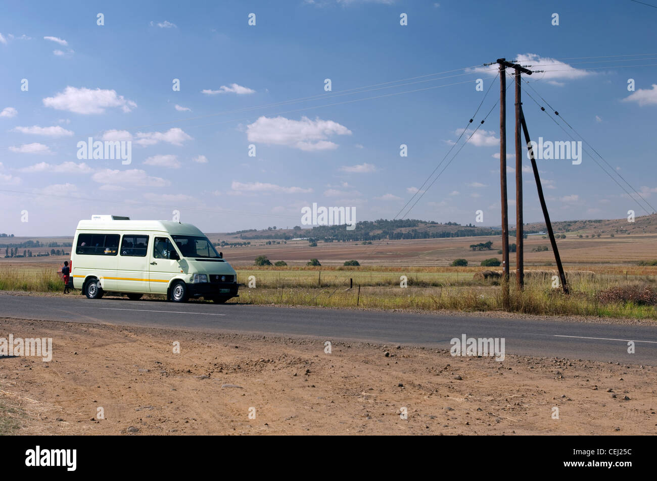 Taxi on rural road near Clarens,Eastern Free State Province Stock Photo