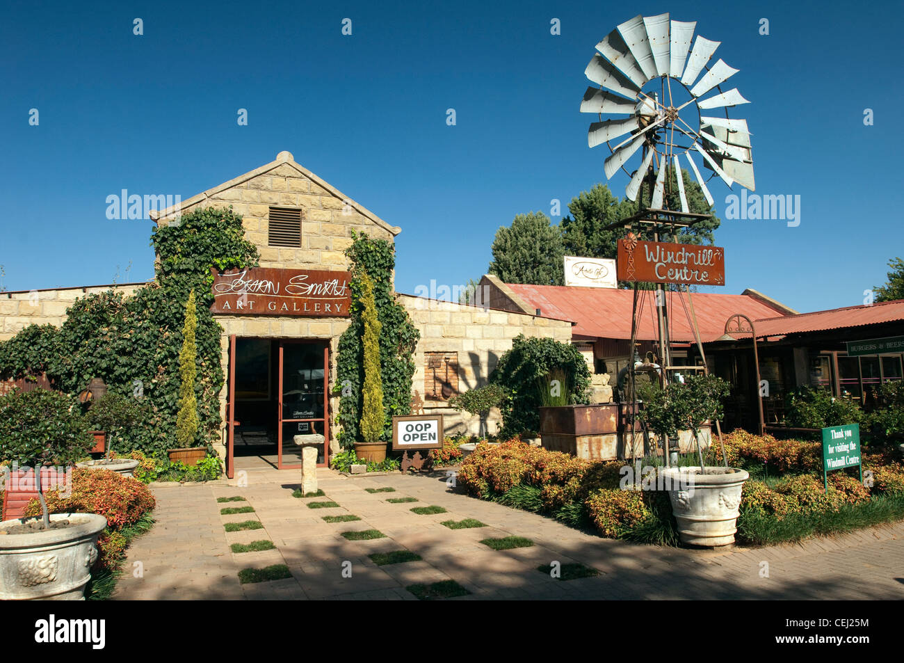 Windmill outside art gallery,Clarens,Eastern Free State Province Stock Photo