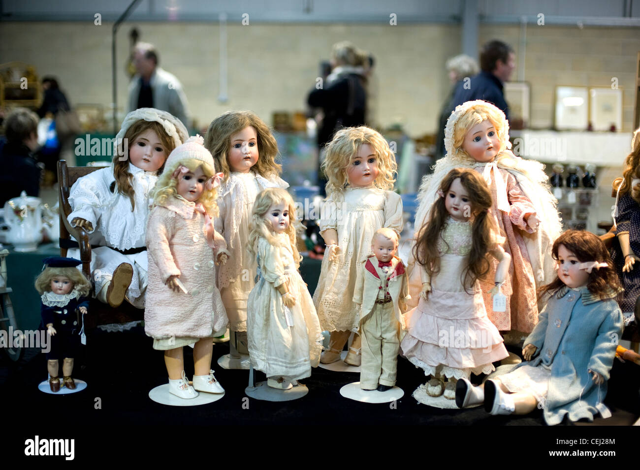 Selection of antique dolls, Ardingly antiques fair, West Sussex Stock