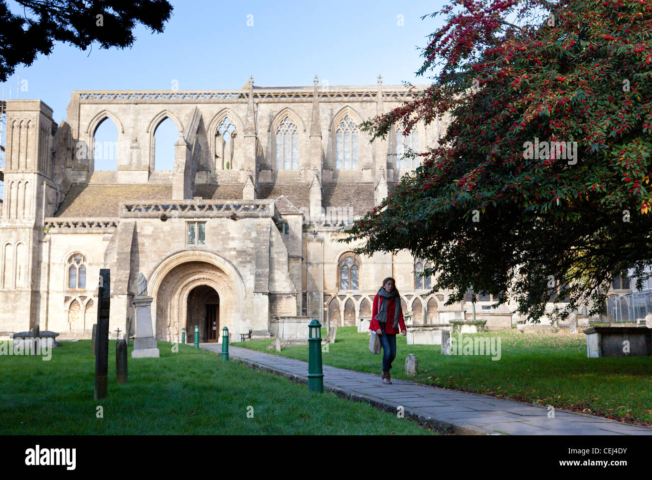 Malmesbury Abbey with its Norman south porch. The earliest parts of the building date from the 12th century. Stock Photo