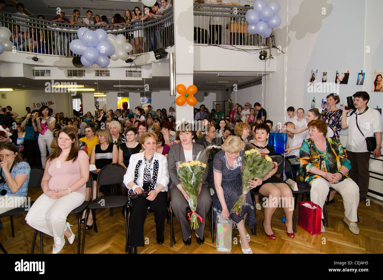 People at concert at local school in Moscow, Russia Stock Photo