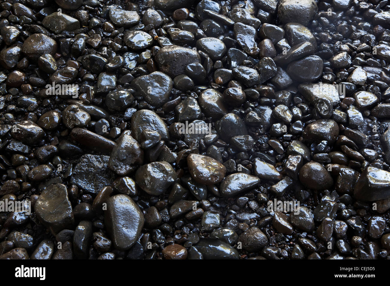 Shiny black stones background Stock Photo