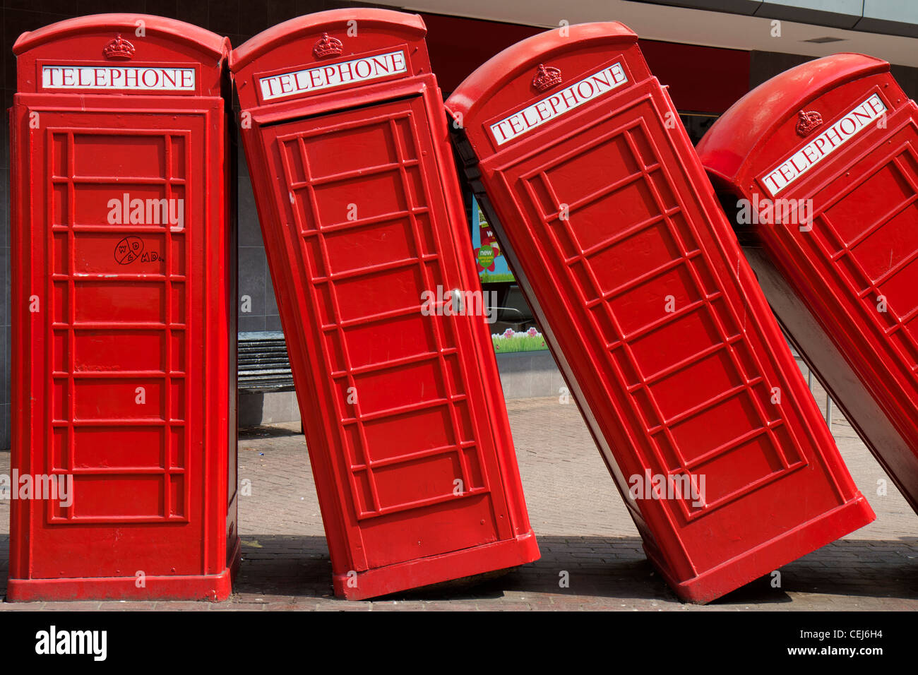 Side view of a Sculpture of red telephone boxes in Kingston Upon Thames