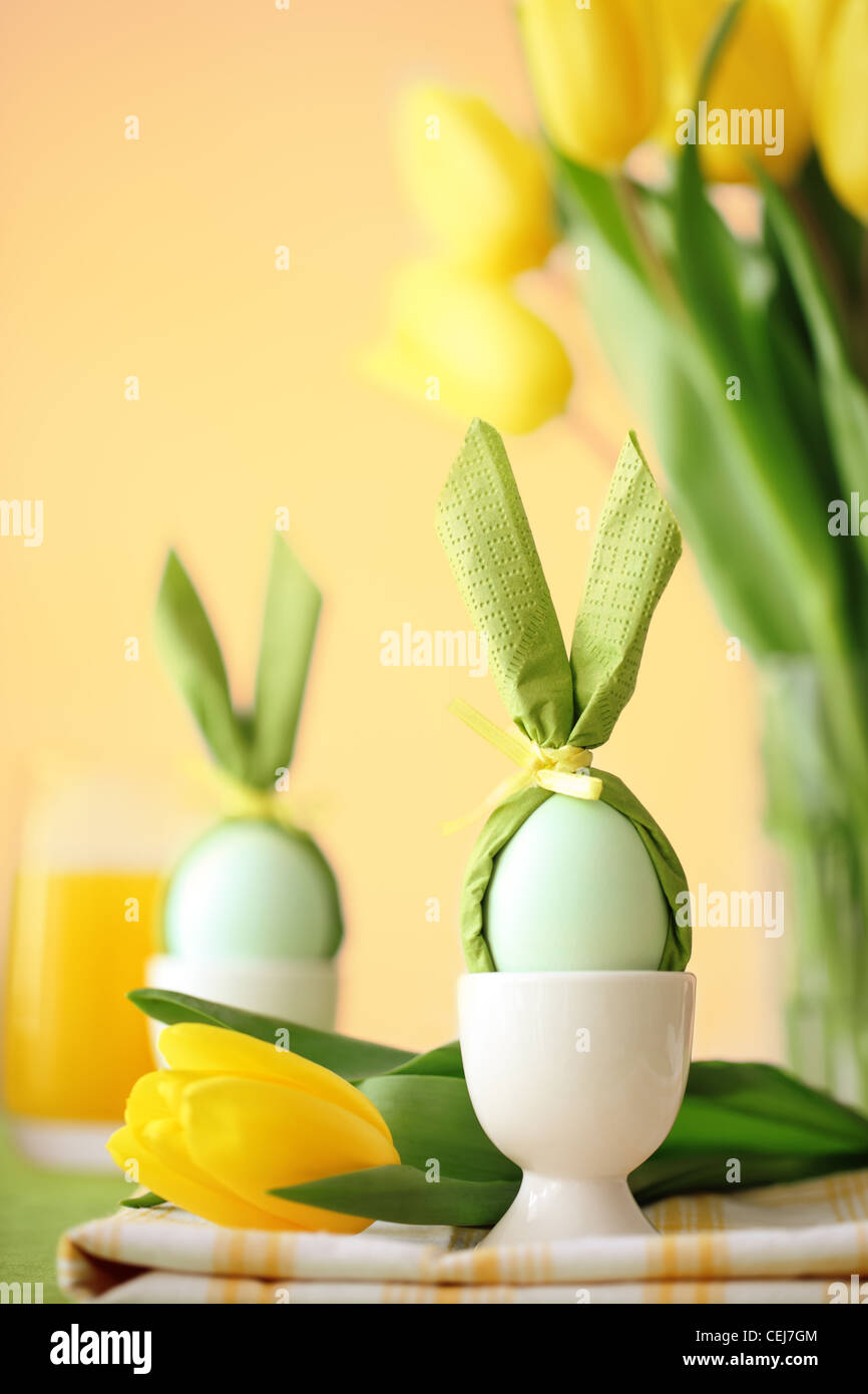 Easter table,Closeup on easter egg with eggcup. Stock Photo
