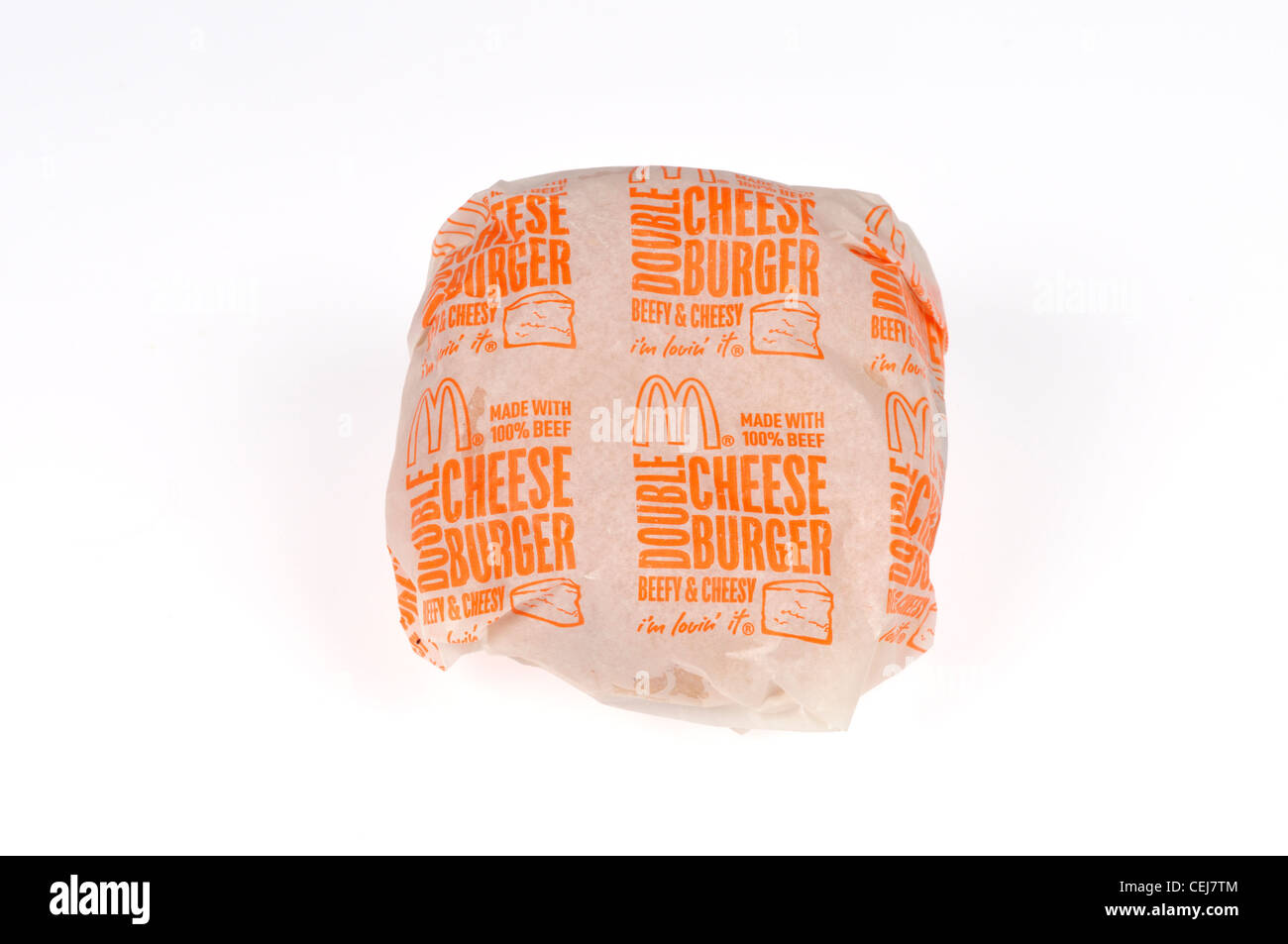 Wrapped McDonalds double cheeseburger on white background cutout USA Stock Photo