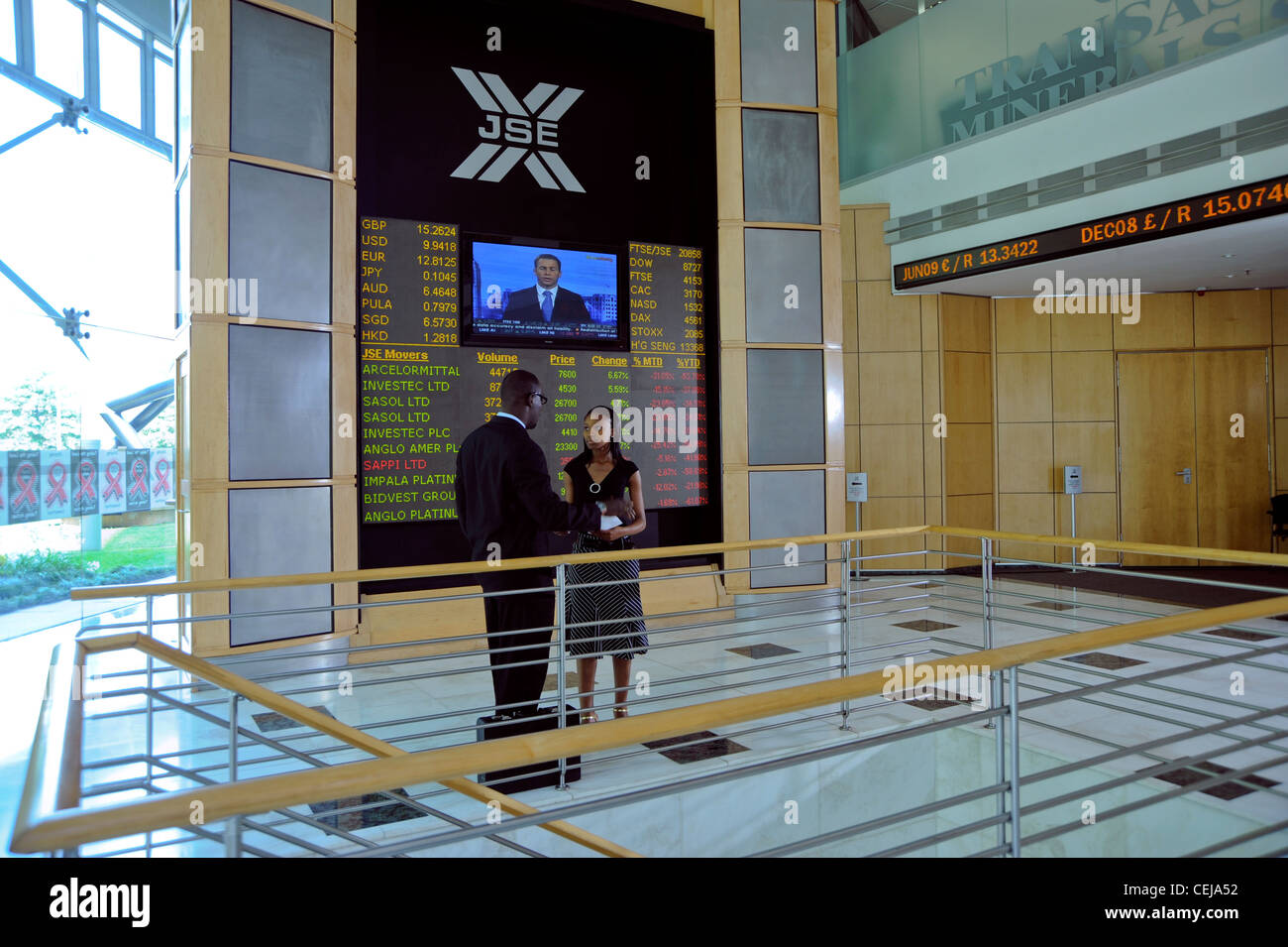 Business people inside the Johannesburg Stock Exchange Stock Photo