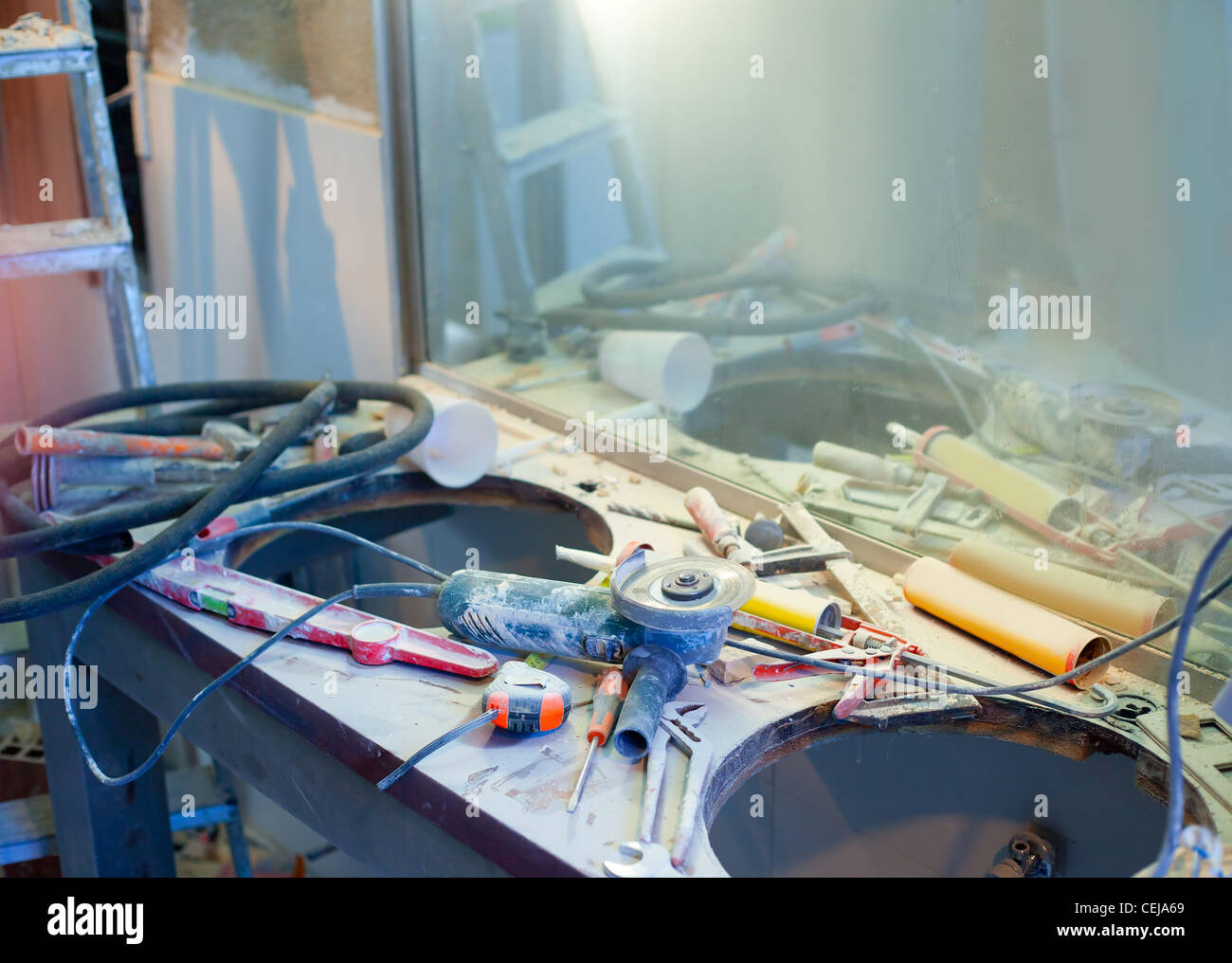home improvement repair messy clutter with dusted tools handtools Stock Photo