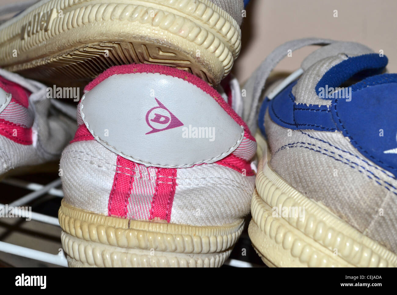 Shoe rack with dunlop volleys Stock Photo