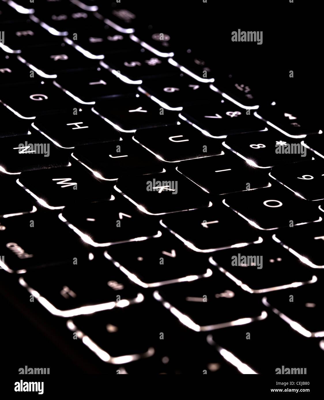 Closeup of Backlit Computer Keys Glowing Stock Photo