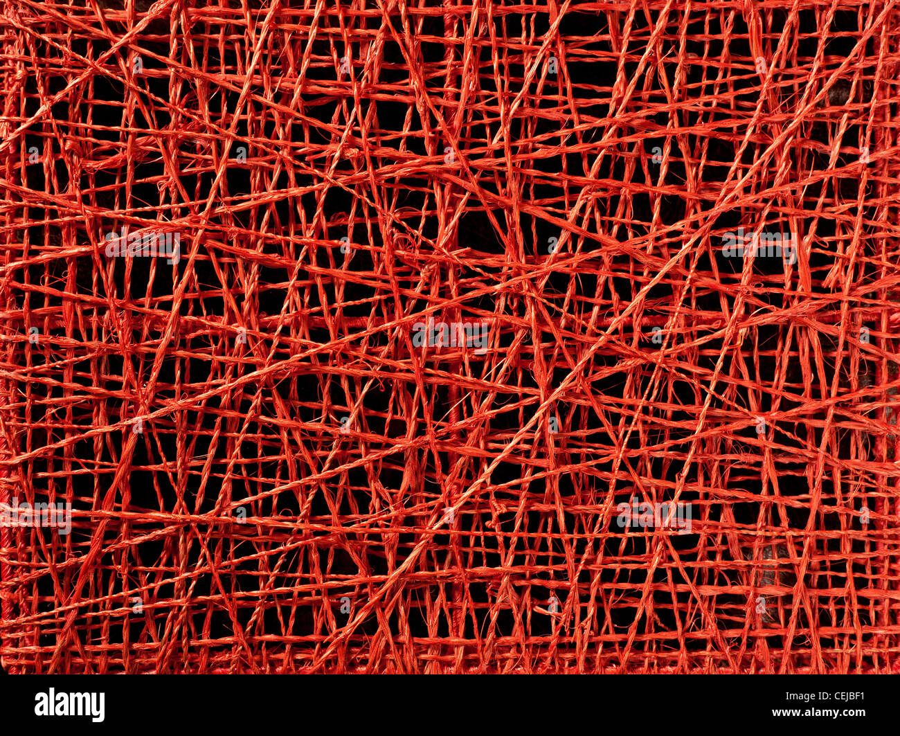abstract red thread texture with irregular crossed lines Stock Photo