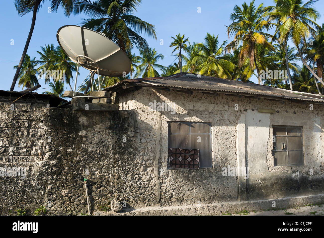 Satellite dish in Bwejuu village east coast of Zanzibar Tanzania Stock Photo