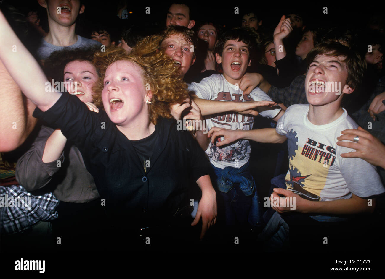Pop Concert 1980s UK. Adolescent fans screaming at a pop music concert. Pop group are called Big Country on tour Scotland 80s HOMER SYKES Stock Photo