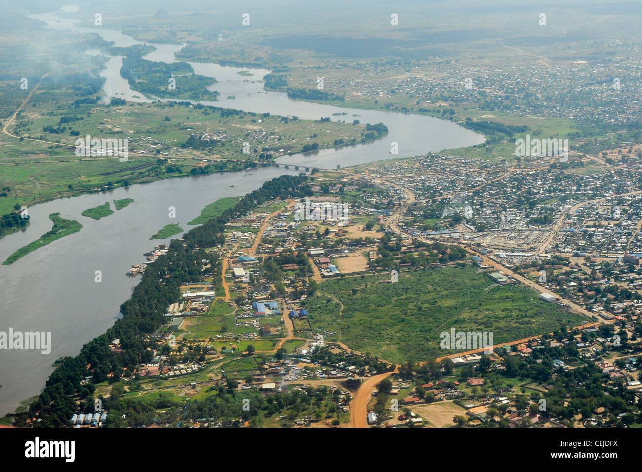 SOUTH SUDAN, aerial view of capital Juba at river white Nile and Nile bridge, Nile port with cargo and passenger ships Stock Photo