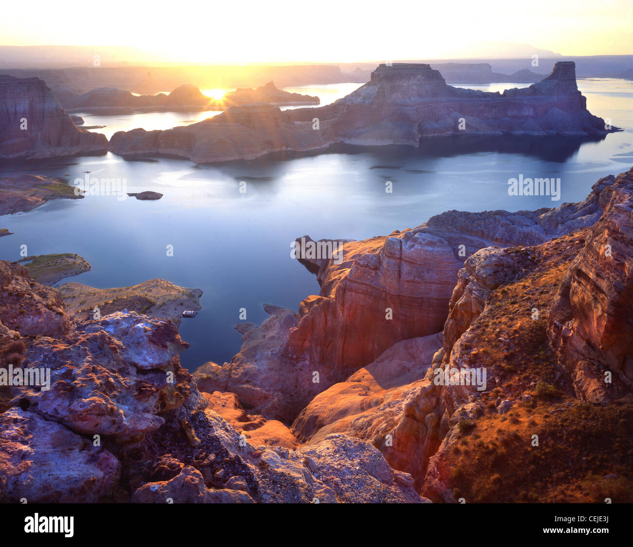 Sunrise over Gunsight Butte on Gunsight Bay on Lake Powell in Glen