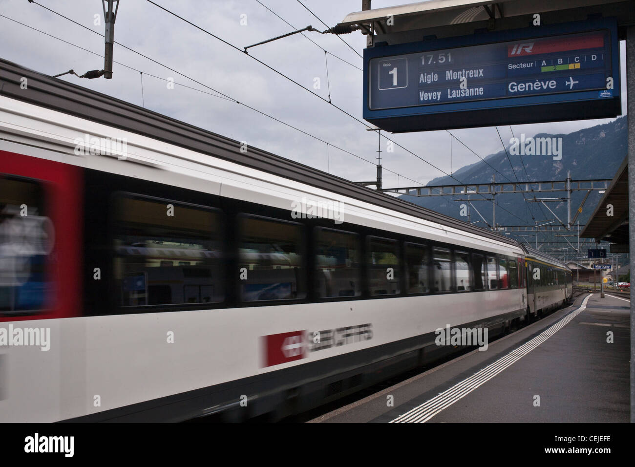 Blurred Swiss train passes through Martigny rail station in Switzerland  Stock Photo - Alamy