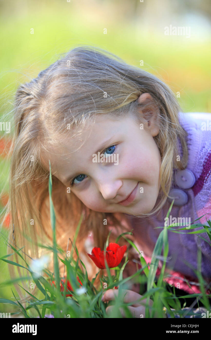 portrait of blond child outside in nature Stock Photo