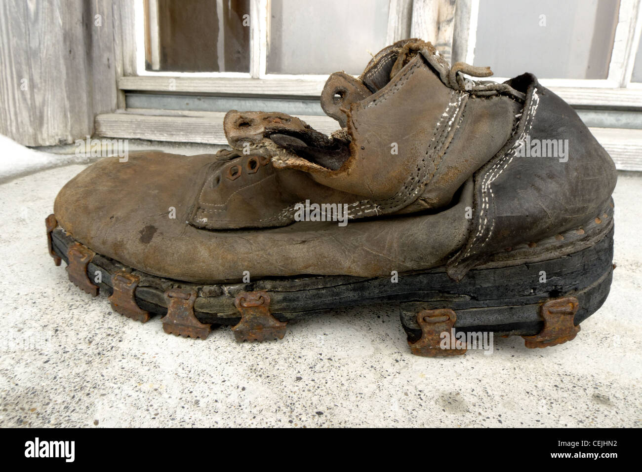 An old hob nailed boot Stock Photo - Alamy