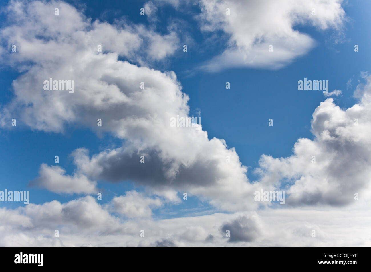 Blue sky with clouds in a beautiful sunny summer day Stock Photo - Alamy