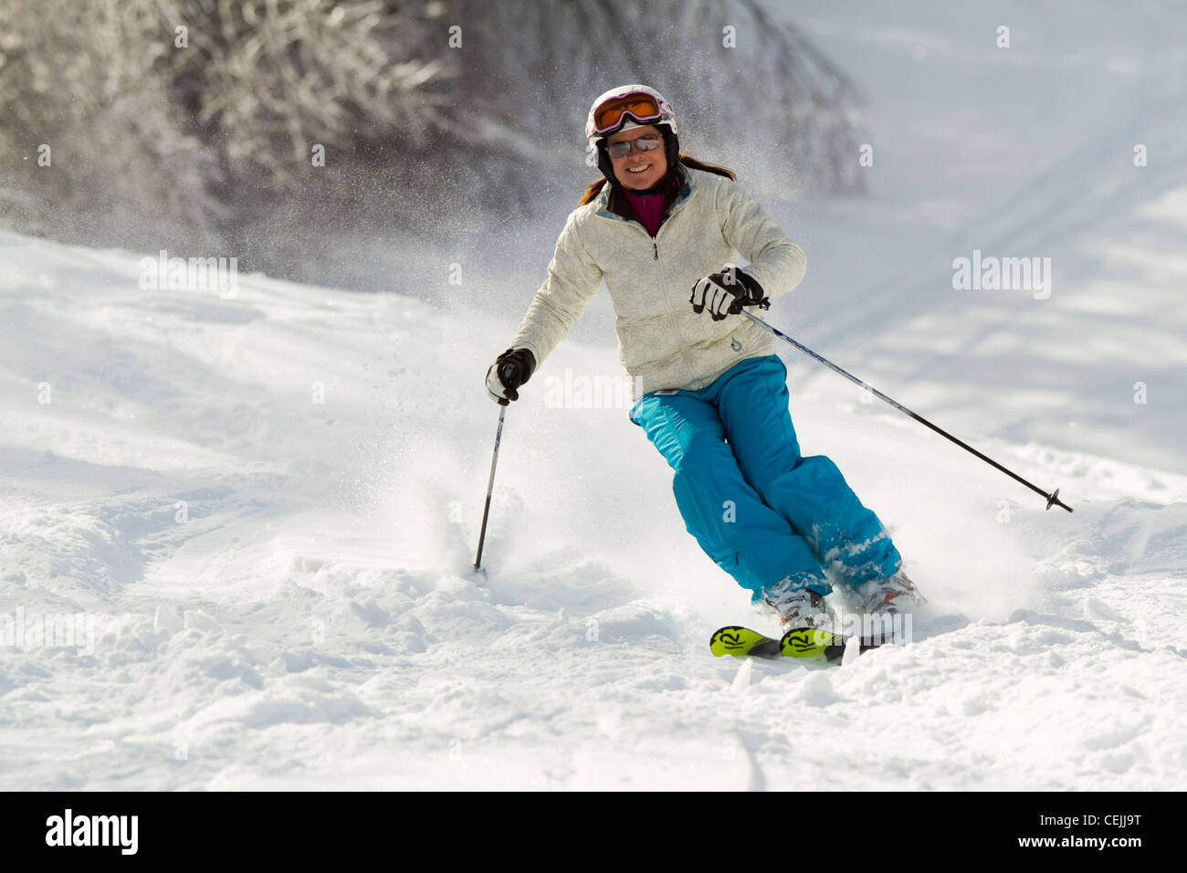 A skier comes down a frosty slope at Bretton Woods Ski area in New Hampshire's White Mountains. Stock Photo