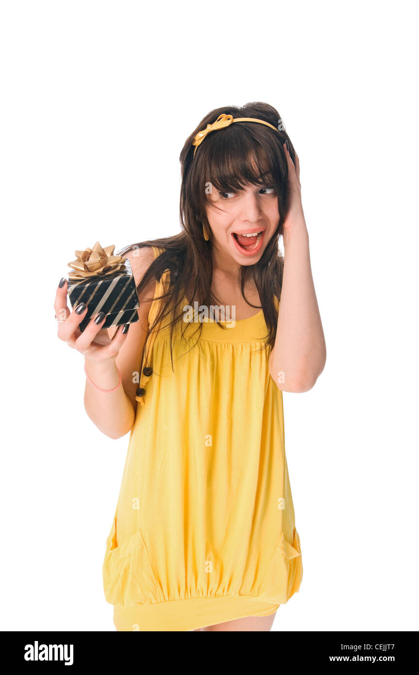 Beautiful girl with gift box isolated on white background Stock Photo