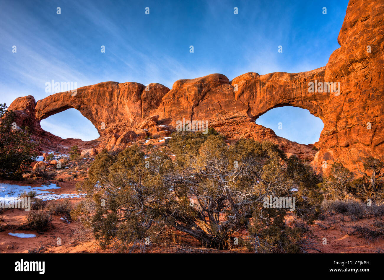 The North and South Window Arches form openings in the same sandstone fin. Arches Nat'l Park. Utah Stock Photo