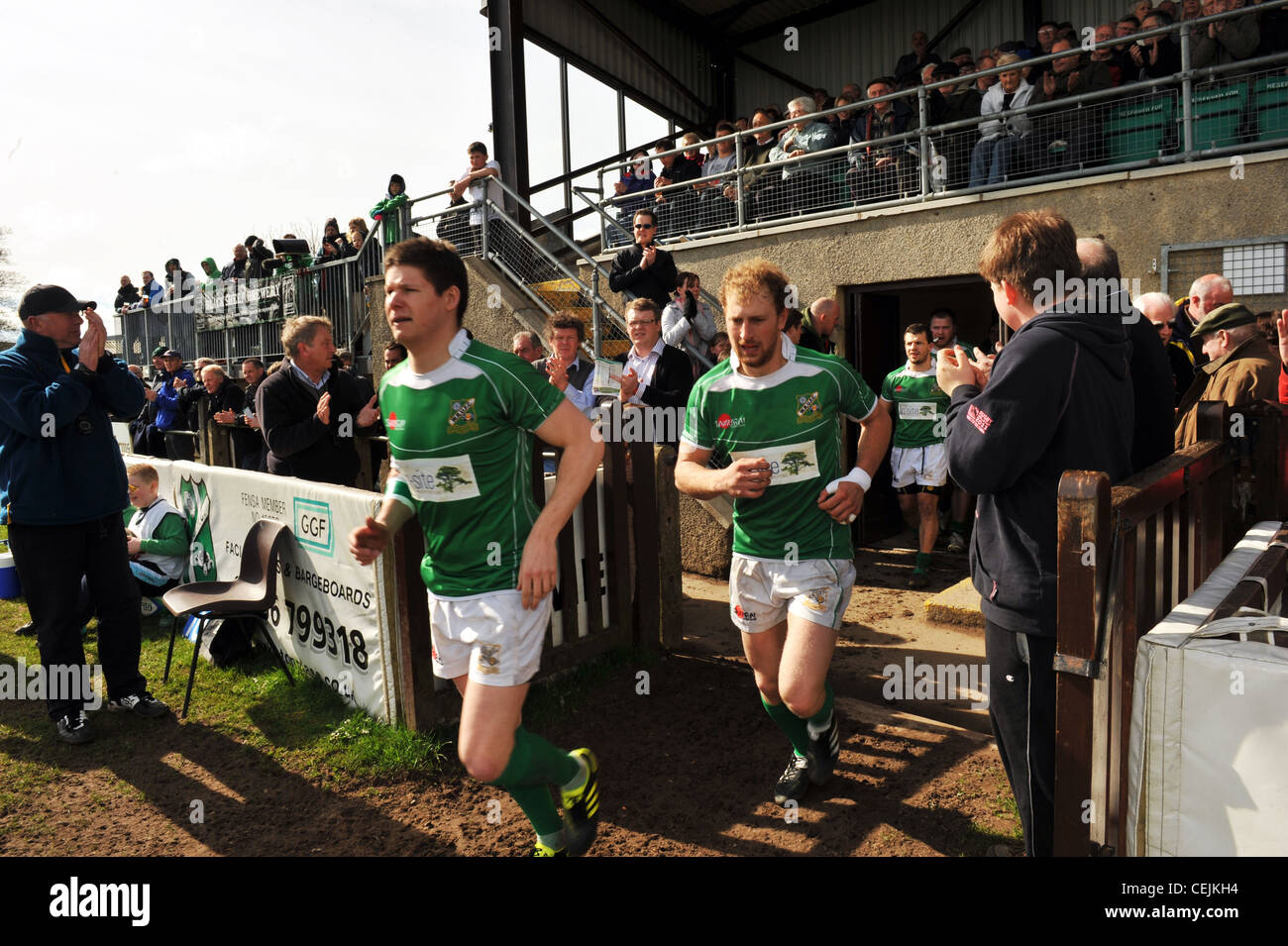 Players enter the pitch to a Rugby game, Wharfedale Rugby Union Football Club, North Yorkshire UK Stock Photo