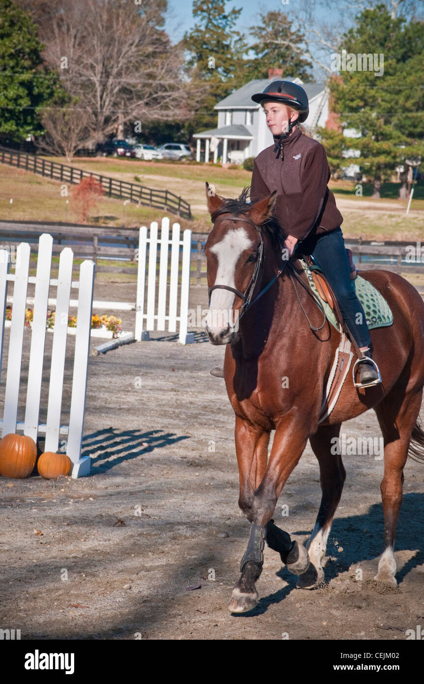 Young girls take horseback riding lessons Stock Photo Alamy