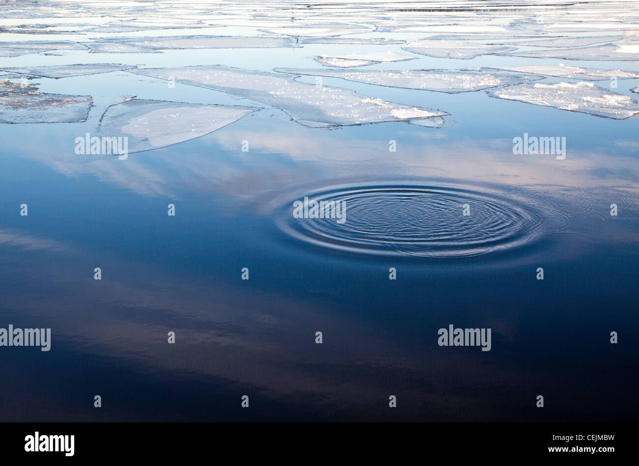 Minimalist photo of ripples in the partially frozen Baltic sea in Tallinn, Estonia Stock Photo