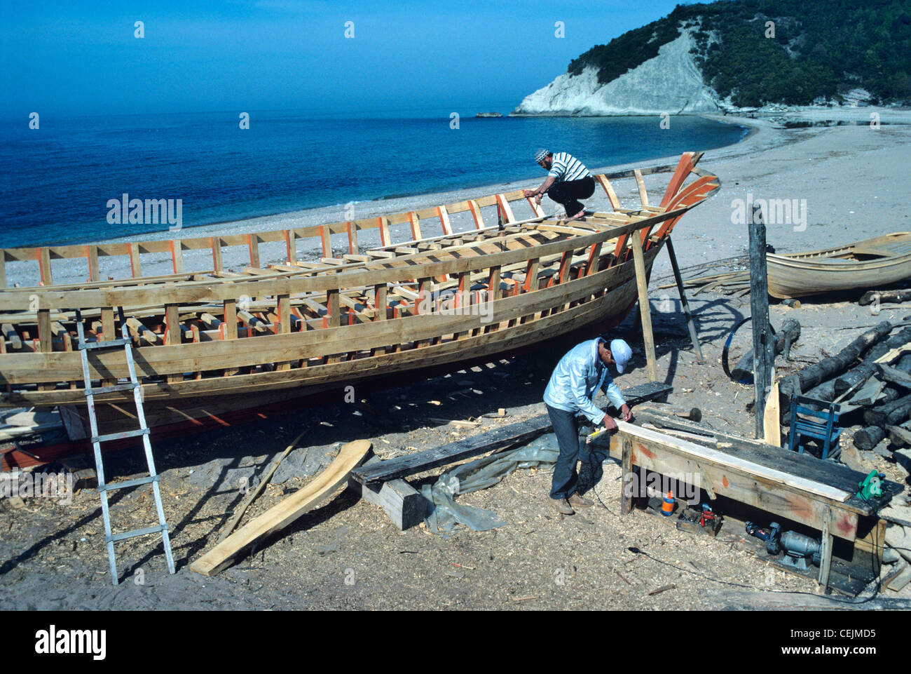 Boat Builders Building Wooden Boats on Beach near Kapisuyu on Turkey's Black Sea Coast, Asmara Turkey Stock Photo