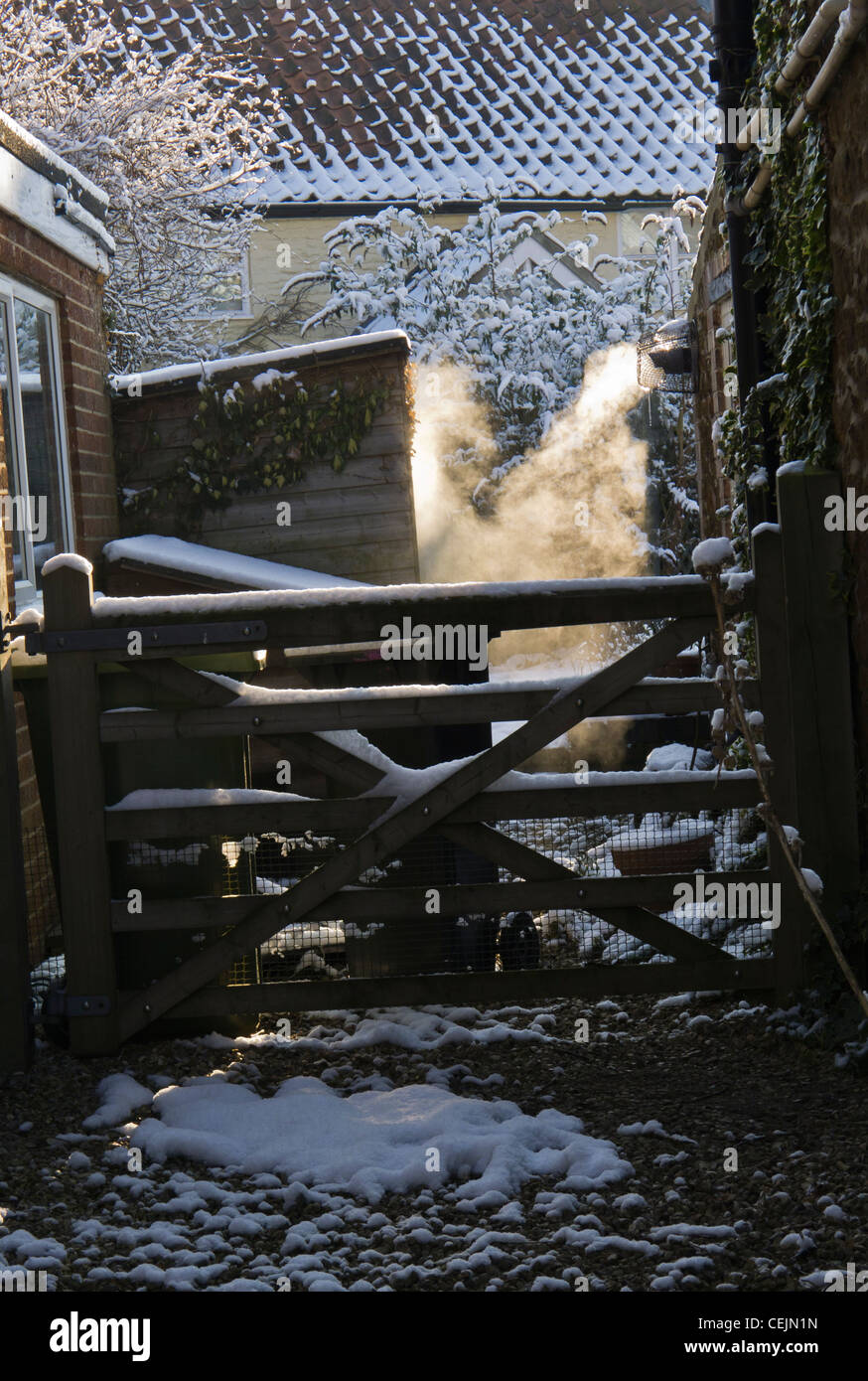 Steam coming from a boiler vent in winter. Stock Photo